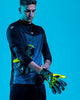 Person wearing Kaliaaer Ignite yellow Goalkeeper Gloves